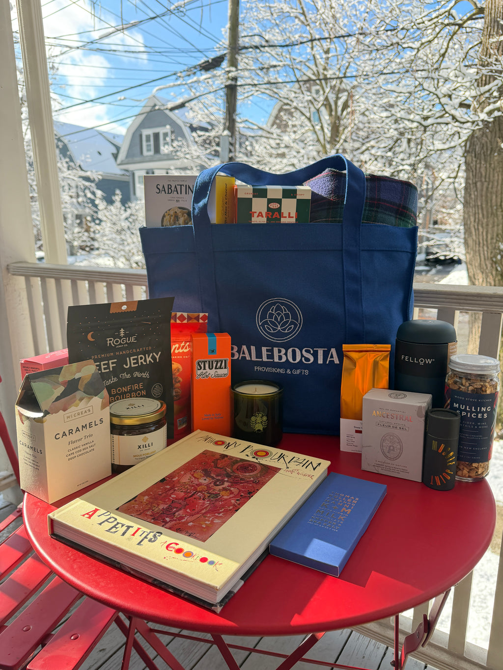 Cozy winter gift box with tea, cookies, luxury scented candle, blanket and a Fellow tumbler by BALEBOSTA