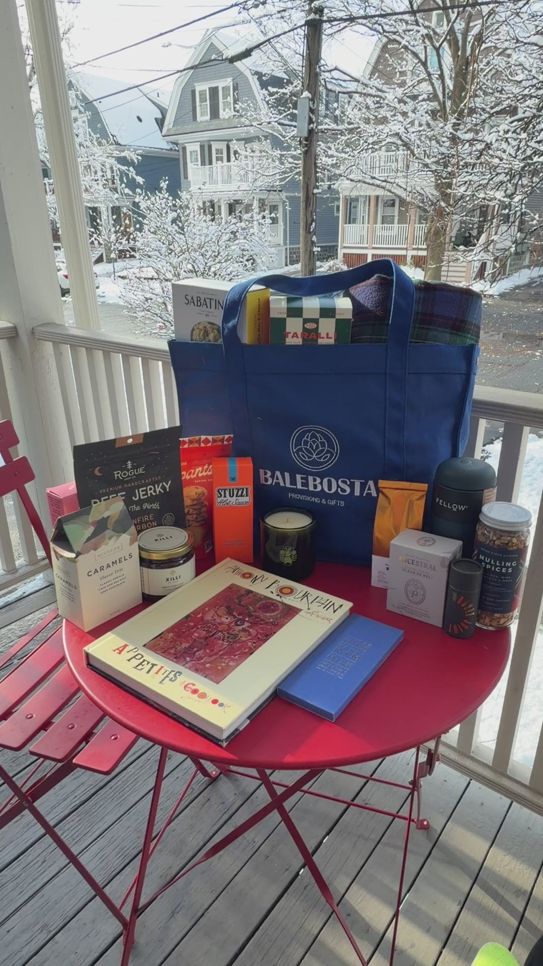 Cozy winter gift box with tea, cookies, luxury scented candle, blanket and a Fellow tumbler by BALEBOSTA
